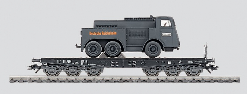 Märklin 4866 H0 Schwerlast-Flachwagen SSym der DR Epoche II beladen mit Kaelble - TOP in OVP