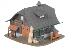 Faller 130010 H0 Jubiläumsmodell Schwarzwaldhaus mit Figur NEU